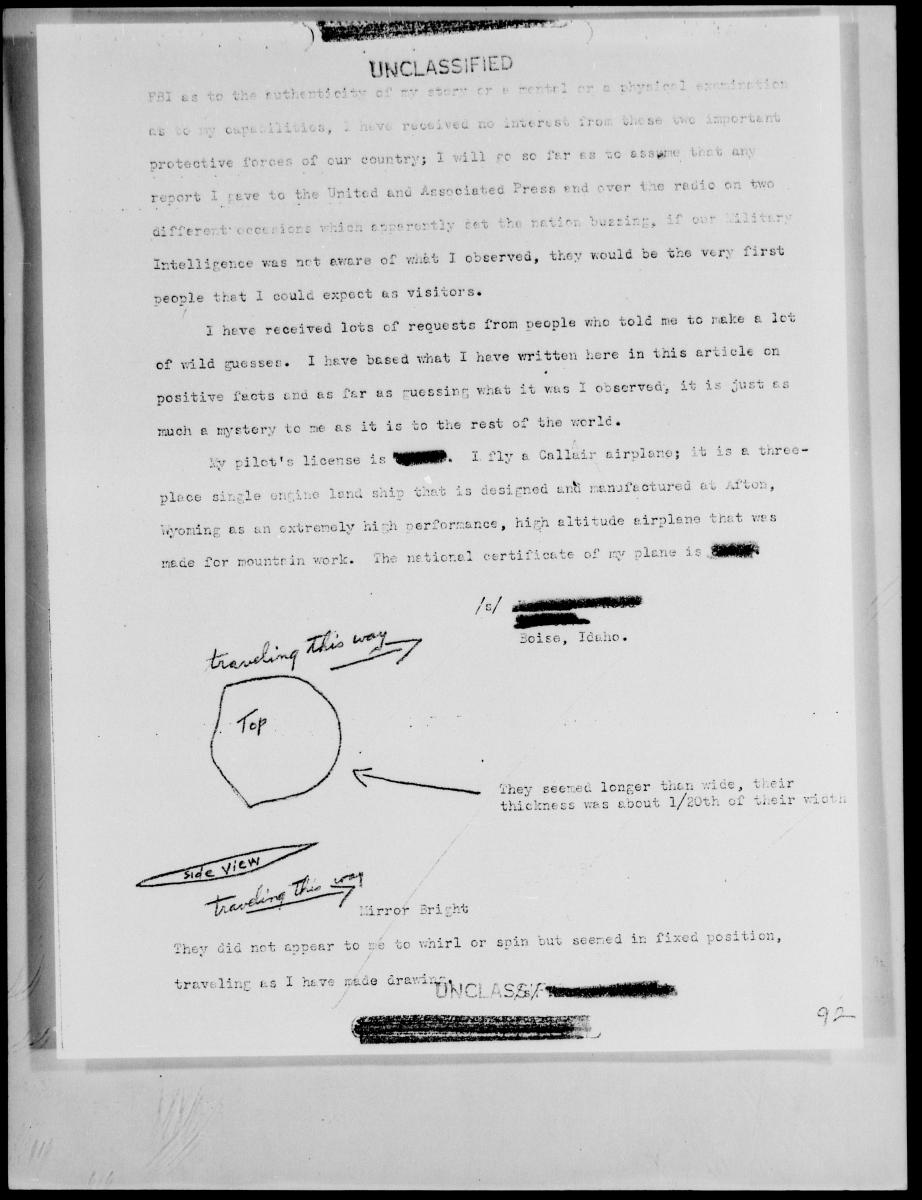 Typed report page with redactions, handwritten top/side drawings, direction arrow and no-spin annotation. Top drawing has rounded front and clipped/angular rear, not a deeply concave crescent.