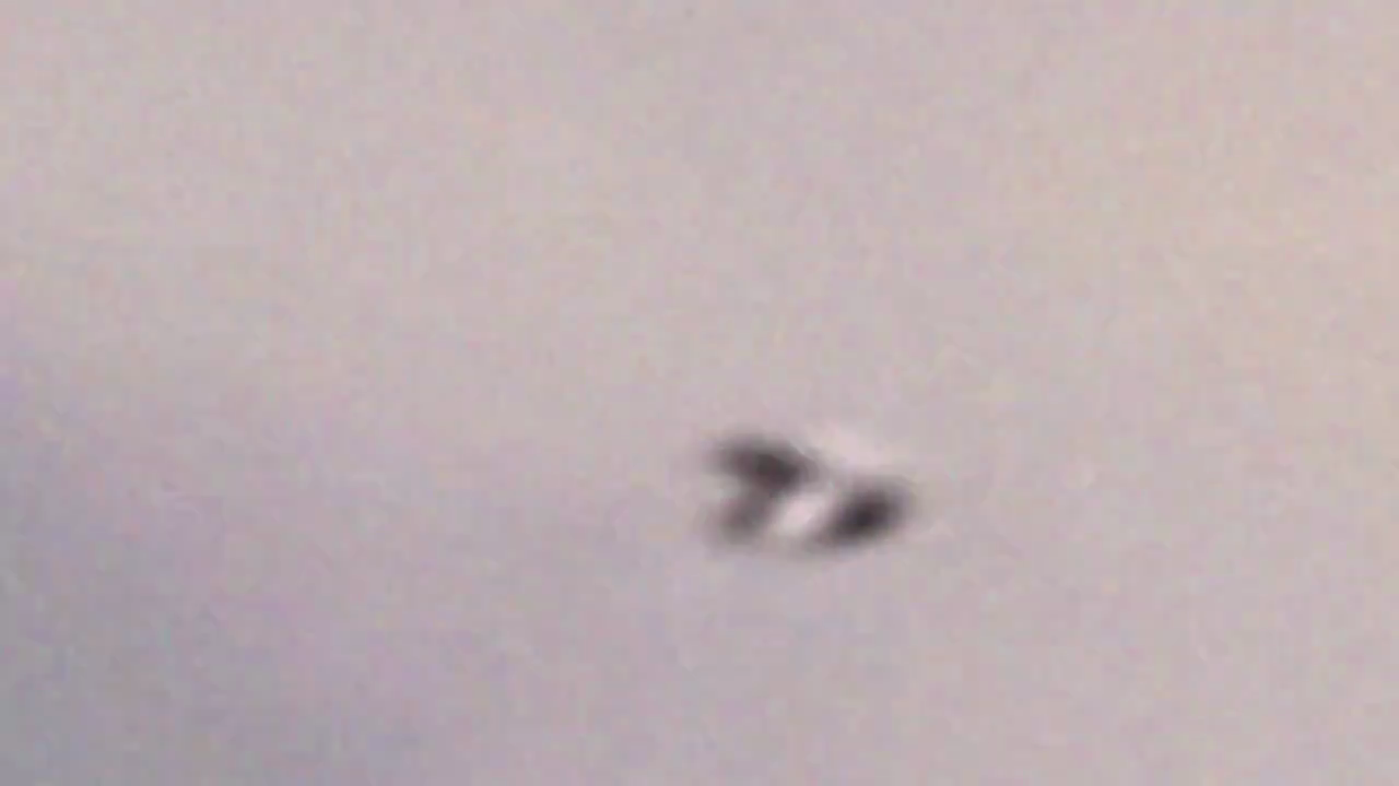 The source video itself switches to an enlarged replay. This is useful for examining the claimed outline, not a new observation or our enhancement. Its processing history was not recovered.